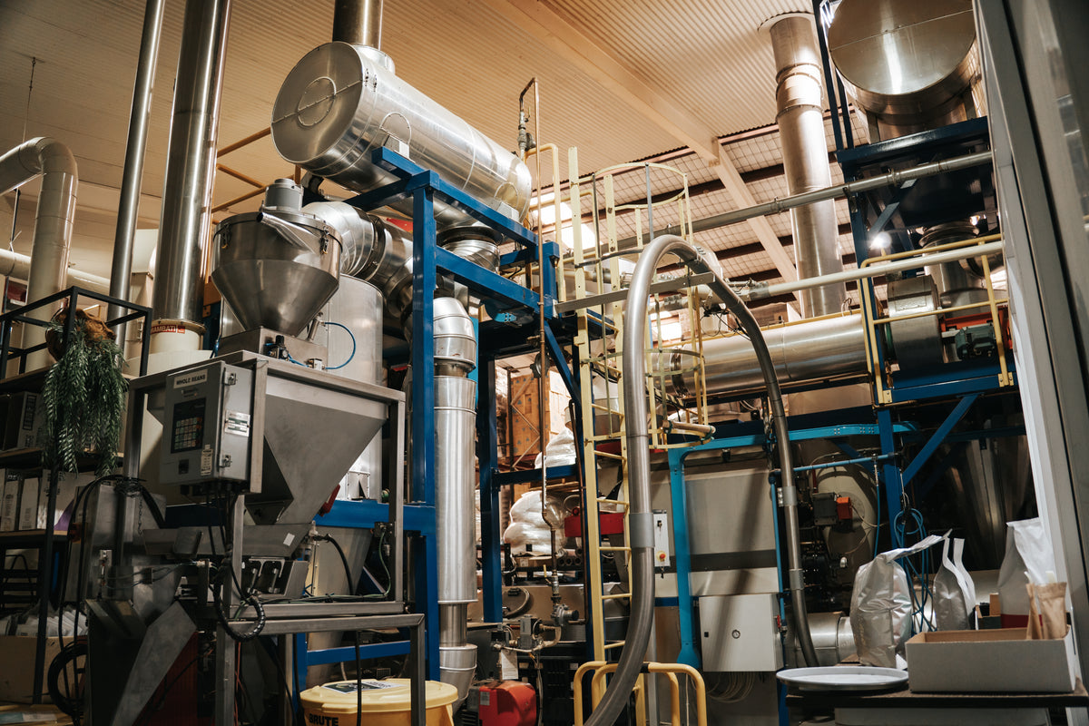 Roasting equipment inside the Adore roastery in Sydney